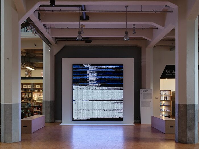 A browser-based work from JODI's Wrong Browser series projected at the exhibition Choose Your Filter! — output produced by code that only runs in a period browser, on a machine that must keep running for months.